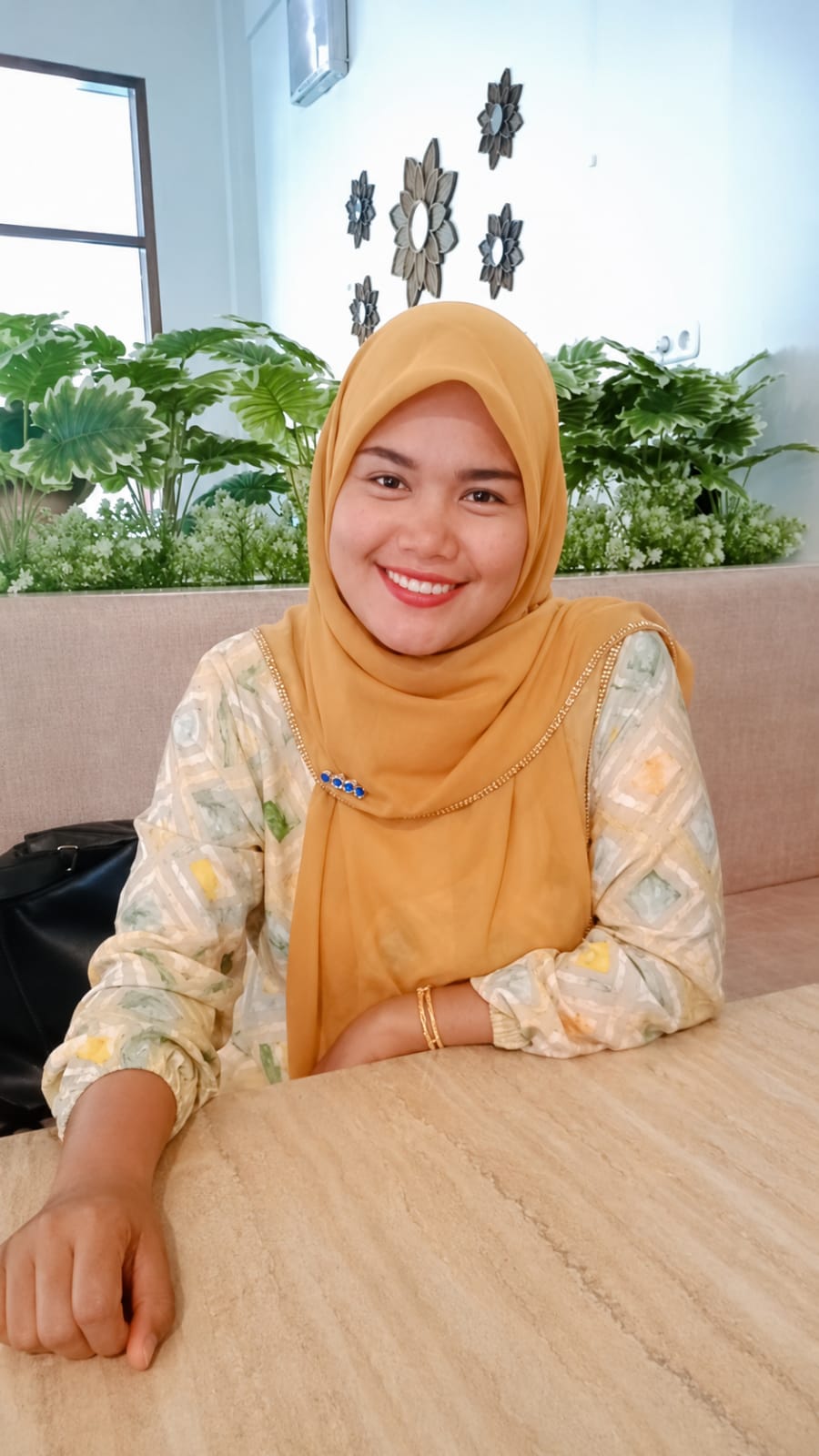 EVA JUNIANTI, S.Pd